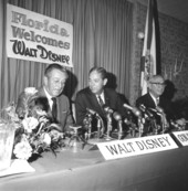 Walt Disney with company at press conference - Orlando, Florida.