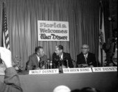 Walt Disney with company at press conference - Orlando, Florida.