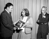 Governor Claude Kirk presenting award to Marjorie Carr while her husband Dr. Archie Carr looks on - Tallahassee, Florida.