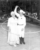 Thelma Boltin experiencing trick roping by Danny Coflin at the 1970 Florida Folk Festival - White Springs, Florida