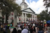 Crowd listening to speeches during the Never Again Rally at the Old Capitol in Tallahassee.