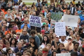 Close-up view showing student demonstrators and gun-control activists at the Never Again Rally in Tallahassee.