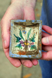 Painted ceramic artifact piece found during excavation of cistern at The Grove in Tallahassee, Florida.