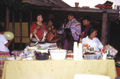 Photographer's wife Gladys giving gifts during Christmas feast at Susie Billie's village in Ft. Myers.