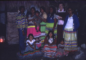 Photographer's wife Gladys posing with Susie Billie's family.