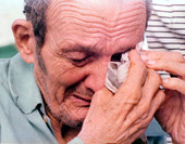 Cuban refugee breaks down upon his arrival at Key West, Florida from Mariel, Cuba during the Mariel Boatlift.