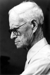 Profile portrait of Talmaege Culmer during cigar making at the Key West Cigar Factory in Pirate's Alley.