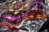 Close-up view of custom motorcycles on Duval Street during the annual Poker Run - Key West, Florida.