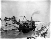 Canal being dredged by steam shovel for the Everglades drainage project