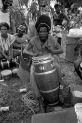 Eddie Massena from Rasta Samba Gynin playing conga drum during Jamaican Independence Day festival - Miami, Florida