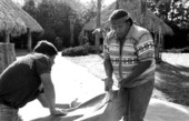 Bobby Henry (L) and Danny Wilcox with a dugout canoe- Tampa, Florida