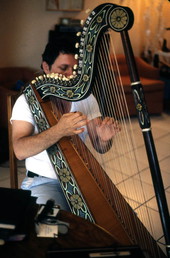 Jesus Rodriguez playing the Venezuelan harp- Naples, Florida