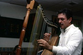 Jesus Rodriguez playing the Venezuelan harp- Naples, Florida