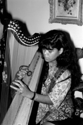 Cecilia Santos plays Venezuelan harp- Miami, Florida.