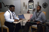 Gospel steel guitarist Aubrey Ghent teaching his apprentice Elton Noble - Fort Pierce, Florida