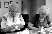 Ola Kryway (L) and apprentice Mary Martin decorating eggs using the Ukrainian pysanky technique - Titusville, Florida.