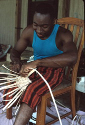 Alphonso Jennings working on a white oak basket - Lamont, Florida