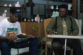 Gospel steel guitarist Aubrey Ghent teaching his apprentice Elton Noble - Fort Pierce, Florida