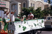 People on float in St. Patrick's Day parade - Lake Worth, Florida.