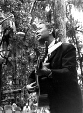 Vietnamese folk singer Pham Duy performing at the 1966 Florida Folk Festival - White Springs, Florida