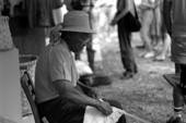 Basket maker Lucreaty Clark splitting white oak strips at the 1984 Florida Folk Festival - White Springs, Florida