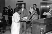 Basket maker Lucreaty Clark accepting the 1985 Folk Heritage Award from Secretary of State George Firestone - Tallahassee, Florida.