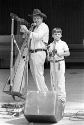 Jesus Rodriguez playing Venezuelan harp at the 1987 Florida Folk Festival - White Springs, Florida