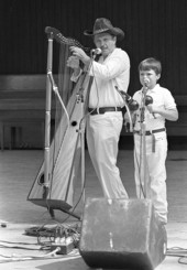 Jesus Rodriguez playing Venezuelan harp at the 1987 Florida Folk Festival - White Springs, Florida