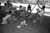 Jesus Rodriguez playing Venezuelan harp at the 1989 Florida Folk Festival - White Springs, Florida