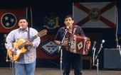 Norteno accordion player Tomas Granado, right, and his apprentice Abraham Arrazola performing at the 1992 Florida Folk Festival - White Springs, Florida.