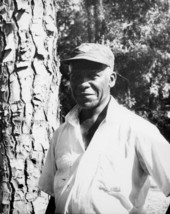 Portrait of Harry Cooper at the Stephen Foster Center during a turpentine demonstration in White Springs, Florida.