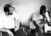 Emmett Murray at a recording session with folklorist Dwight DeVane- Belle Glade, Florida.