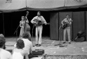 Dale & Linda Crider performing with Gamble Rogers at the Old Marble Stage during the 1982 Florida Folk Festival.