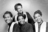 Portrait of the gospel singing quartet Versiteers.