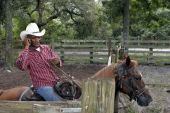 Cattle rancher Tom Everett, Sr. speaking on his cell phone in Sumter County, Florida.