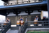 View showing the percussion troupe Matsuriza performing traditional Japanese taiko drumming at the Epcot theme park Japan Pavilion in Lake Buena Vista, Florida.