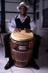 Miguel Lanzo with Puerto Rican musical instruments - Orlando, Florida.