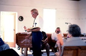 Man leading Sacred Harp singing at the Bethlehem Primitive Baptist Church - Old Chicora, Florida