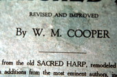 Section of the cover from a copy of the revised "Sacred Harp" by W.M. Cooper