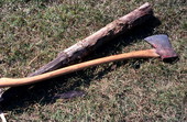 Ax and small piece of white oak used by Lucreaty Clark for basket making