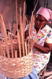 Lucreaty Clark making a white oak basket