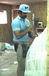 Billy Burbank III beginning the making of a fishing net - Fernandina Beach, Florida