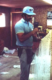 Billy Burbank III weaving a fishing net - Fernandina Beach, Florida