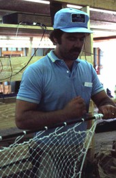Billy Burbank III weaving a fishing net - Fernandina Beach, Florida