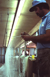 Billy Burbank III weaving a fishing net - Fernandina Beach, Florida