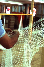 Billy Burbank II weaving a fishing net - Fernandina Beach, Florida