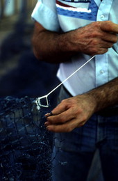 Billy Burbank II weaving a fishing net - Fernandina Beach, Florida