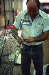 Billy Burbank II weaving a fishing net - Fernandina Beach, Florida