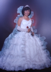 Fifteen year old Cuban American girl in her Fiesta de Quince dress - Miami, Florida.
