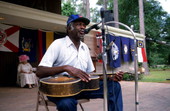 Tom Walton playing guitar - White Springs, Florida